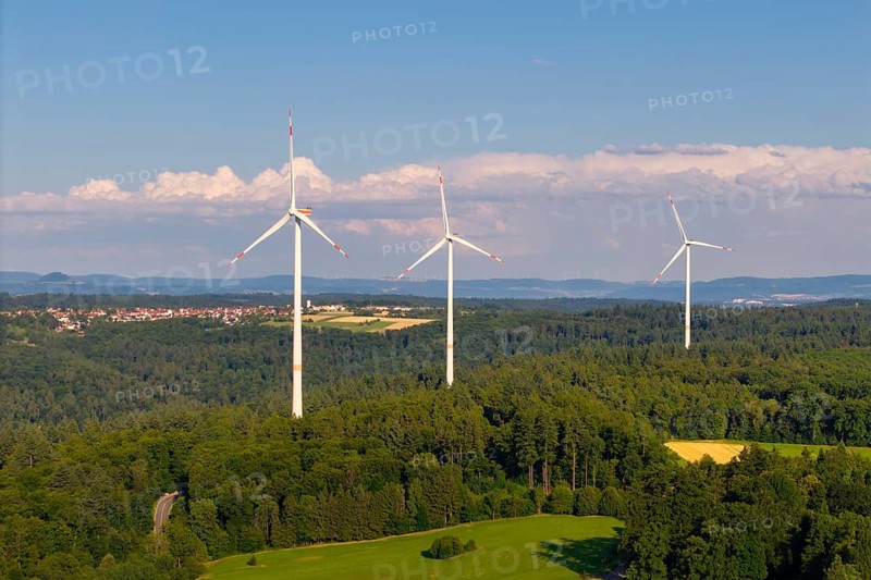 Three wind turbines on a hill in a rural landscape with forests and meadows, near Schorndorf, Rems-Murr-Kreis, Baden-Württemberg, Germany