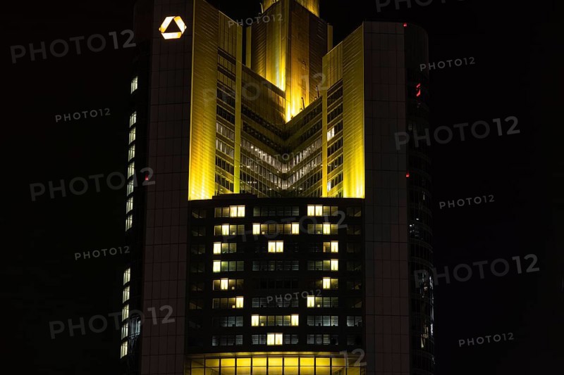 Lights inside the offices project a glowing yellow heart onto the façade of the Commerbank Tower in Frankfurt am Main, Frankfurt am Main, Hesse, Germany