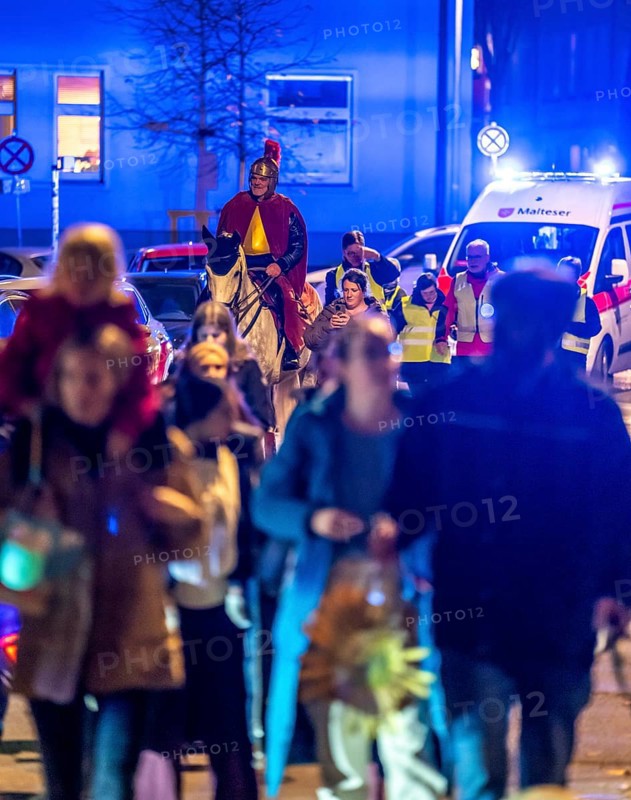 Safety at the Martin train in Essen-Rüttenscheid, the parish of St. Lambertus, accompanied by police and rescue services, Saint Martin performer on a horse, with over 500 participants, North Rhine-Westphalia, Germany