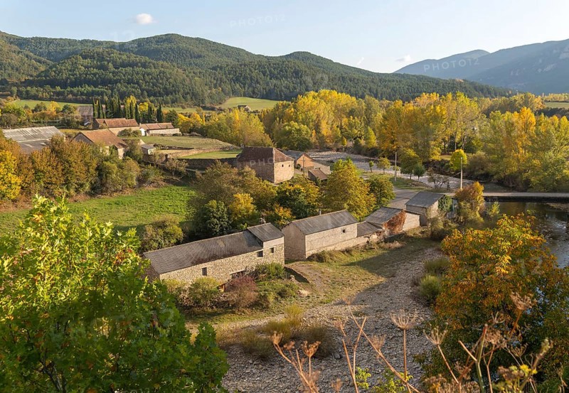 Farm buildings barns autumn landscape village of Echo or Hecho, Valle de Hecho, Huesca province, Aragon, Spain