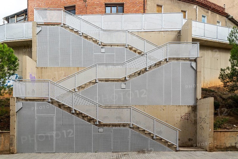 Metal staircase street climbing up steep hillside, city of Teruel, Aragon, Spain