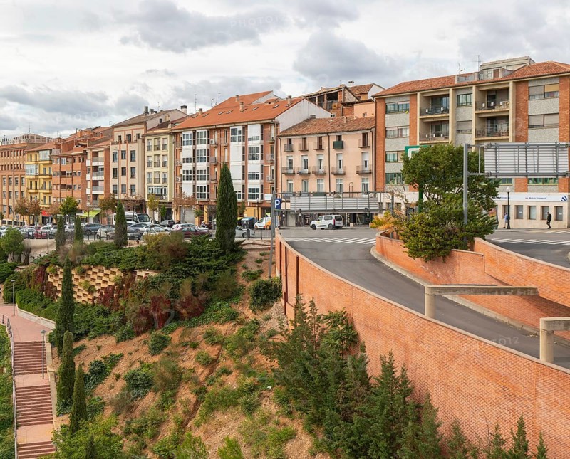 Traffic and buildings on Ronda de Ambeles street, city of Teruel, Aragon, Spain