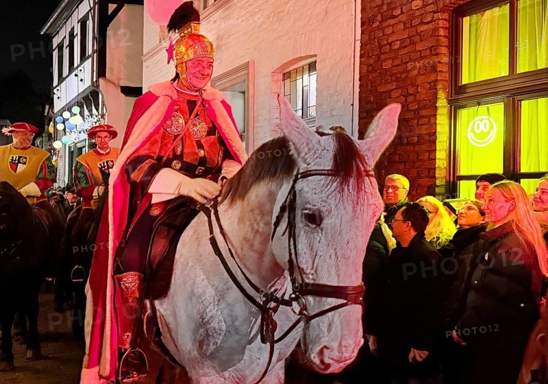 St. Martin on a white horse train in Alte Schulstraße in the evening, Altstadt, Kempen, Lower Rhine, North Rhine-Westphalia, Germany