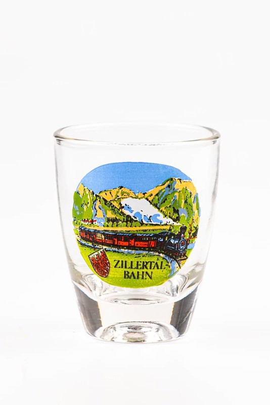 Schnapps glass with decorative Zillertal railway motif, colorful mountains and railroad