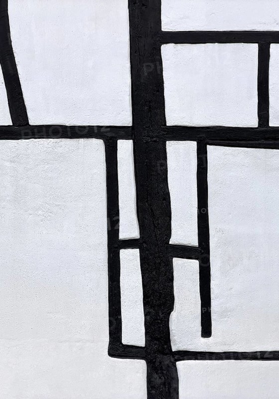 Unusual framework of irregularly arranged rectangular wooden beams in three compartments, semi-abstract detailed view, Kuhstraße 35, Kempen, North Rhine-Westphalia, Germany