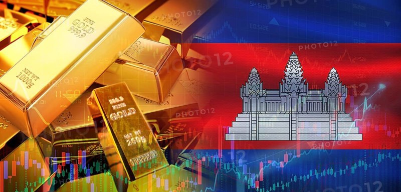 Gold bars stacked on Cambodian flag. Cambodia gold reserves, Concept