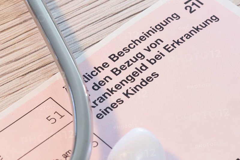 Close-up of a medical certificate for receiving sickness benefit if the child is ill