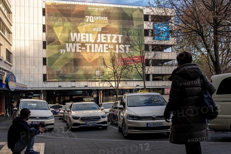 Large-format advertising poster, of the Bundeswehr, for personnel recruitment, at a parking garage in Essen, at the main train station, We-Time, 70th anniversary of the Bundeswehr, North Rhine-Westphalia, Germany