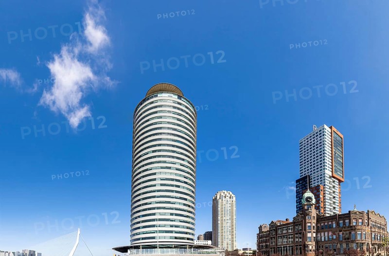 Panoramic view of Rotterdam Old Port and river promenade waterfront areas of Wilhelminakade and Kop van Zuid. Financial business district skyline