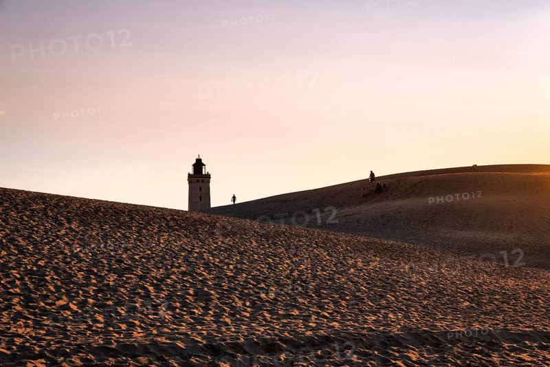Rubjerg Knude lighthouse, walkers on hiking dune, evening mood in summer, Løkken, Lokken, Nordjylland, North Jutland, Denmark