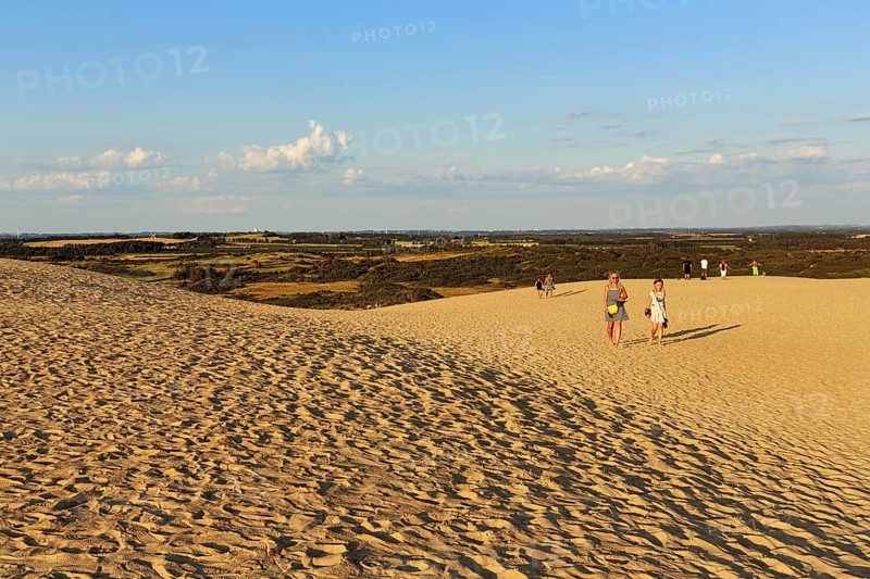 Rubjerg Knude, walker on the horizon, hiking dune in summer, Løkken, Lokken, Nordjylland, North Jutland, Denmark