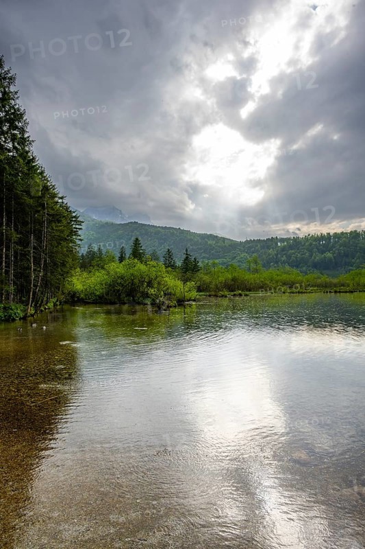 Landscape of Lake Almsee on a rainy day in spring, Salzkammergut, Austria