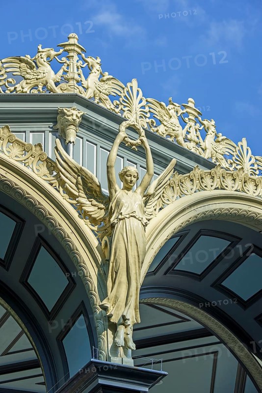 Nike goddess of victory, griffins and palmettes decorating 1885 Kiosk, music pavillion at the Citadel park in the city Ghent, East Flanders, Belgium