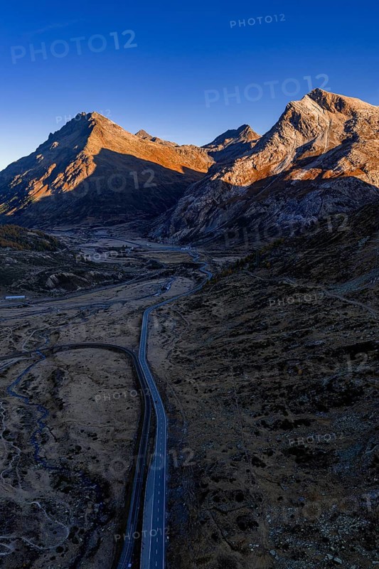 Mountain landscape, autumn, morning light, aerial view, road, Bernina Pass, Engadin, Switzerland