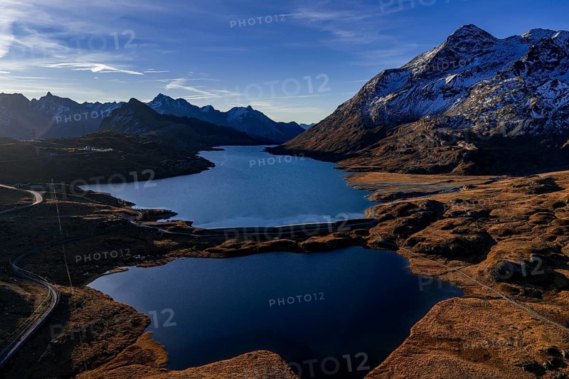 Mountain landscape, autumn, morning light, aerial view, road, mountain lakes, reservoir, Bernina Pass, Engadin, Switzerland