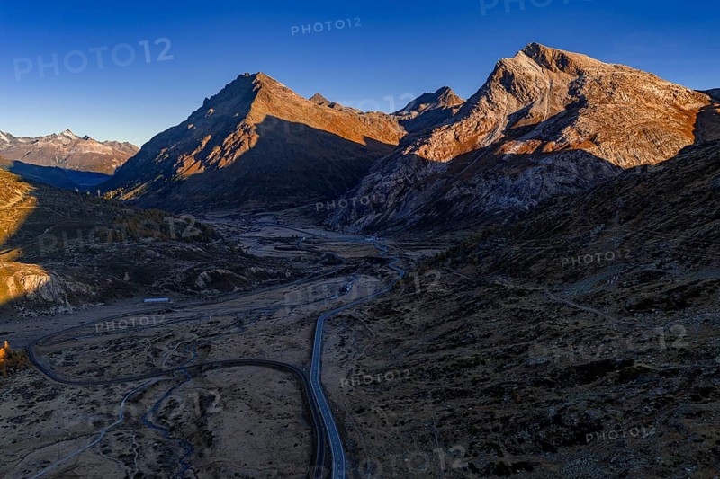 Mountain landscape, autumn, morning light, aerial view, road, Bernina Pass, Engadin, Switzerland