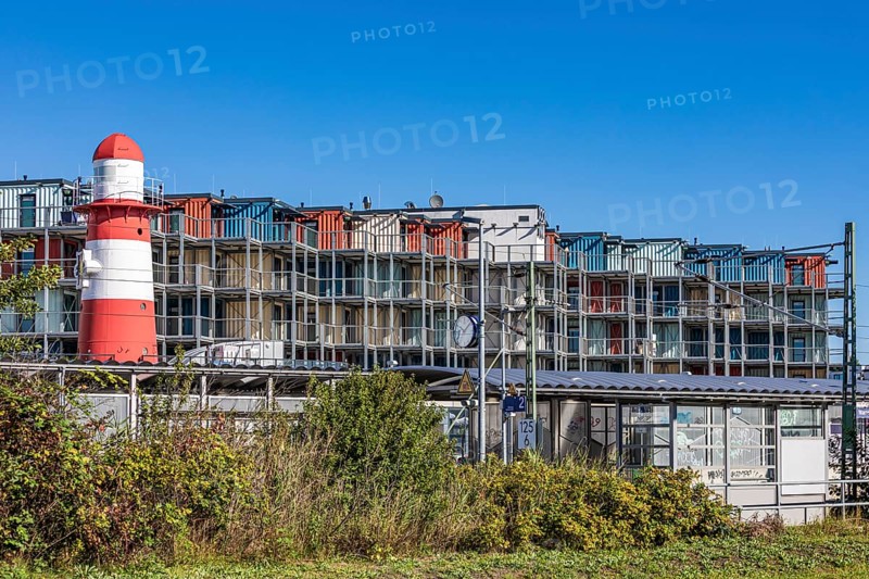 Hotel Dock Inn Hostel made of former containers and the S-Bahn stop in Warnemünde, Mecklenburg-Western Pomerania, Germany