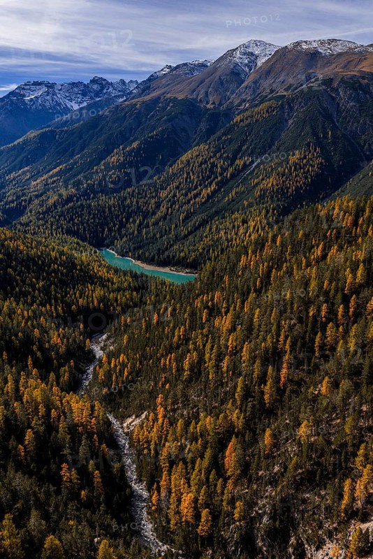 Mountain landscape, wild, untouched, coniferous forest, sunny, riverbed, autumn, larch forest, reservoir, aerial view, Val Müstair, Swiss National Park, Switzerland