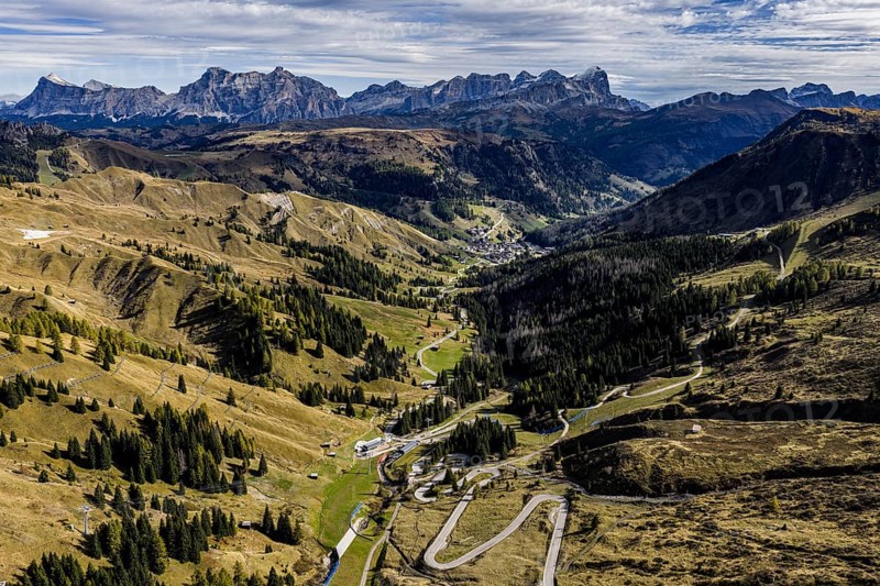 Road, curves, serpentines, pass road, autumn, sunny, Pordoi Pass, view of Tofana Group, Dolomites, Italy