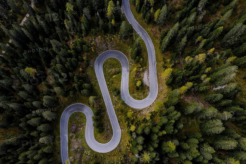 Curvy road, serpentines, pass road, forest, aerial view, Giau Pass, Dolomites, Italy