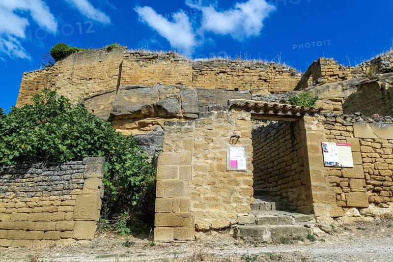 Castle walls built on rock outcrop, medieval village of Uncastillo, Cinco Villas, Zaragoza province, Aragon, Spain