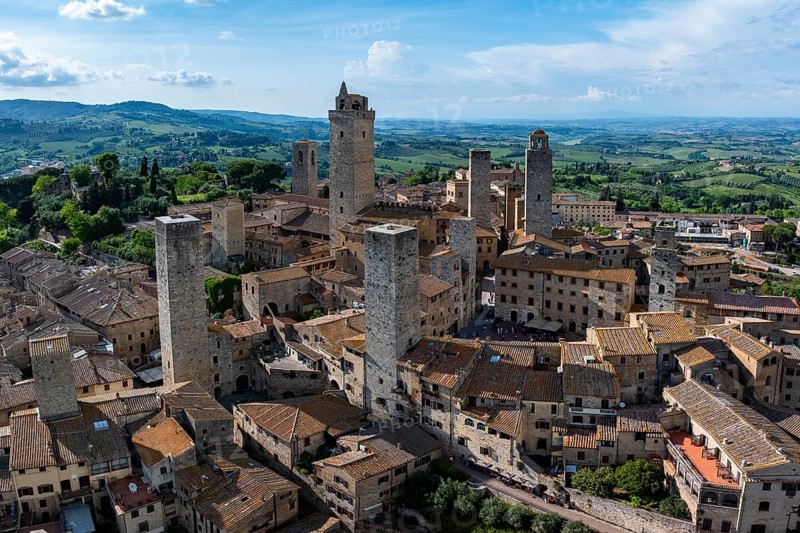 City view of San Gimignano, gender towers and medieval buildings, Tuscany, Italy