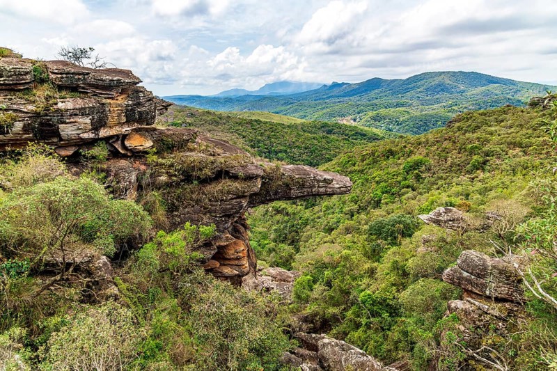 Mountains and forests of the state of Minas Gerais and a rock formation known as the Alligator Rock
