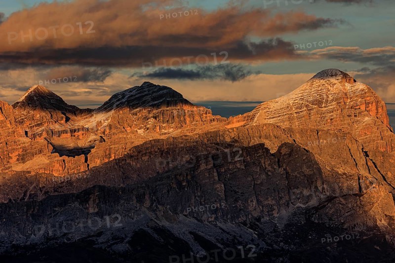 Steep mountains, mountain range, sunset, cloudy, autumn, Pordoi Pass, view of Tofana Group, Dolomites, Italy