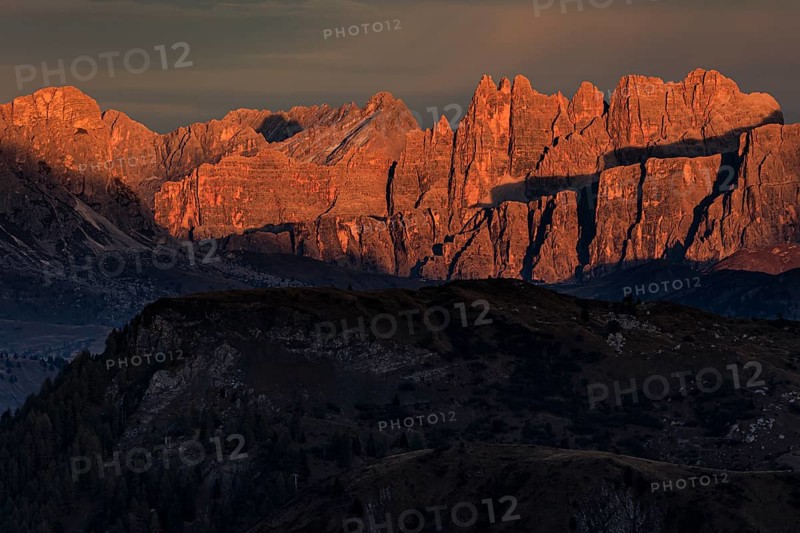 Steep mountains, mountain range, sunset, cloudy, autumn, Pordoi Pass, view of Croda da Lago, Dolomites, Italy