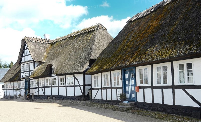 Danish inn, restaurant, in typical half-timbered house with thatched roof on Funen, Fyn island, Denmark, Scandinavia