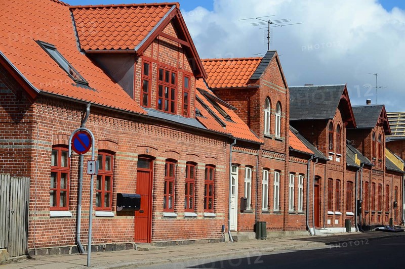 Row of brick houses along a street in Assens, Funen island, Denmark, Scandinavia