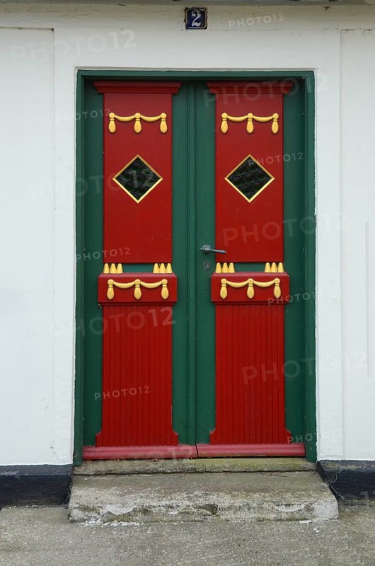 Decorative entrance door in street house in Assens, Funen island, Denmark, Scandinavia