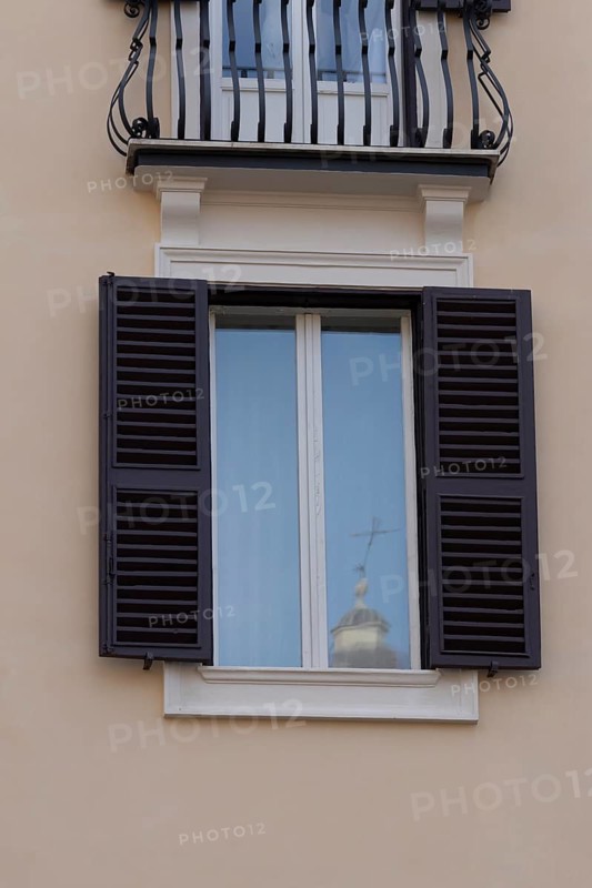 Window of a building in the city of Rome, Italy
