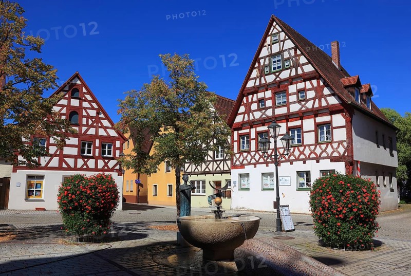 Half-timbered houses and fountains on Rathausplatz, city of Heideck in the district of Roth, Middle Franconia, Bavaria, Germany