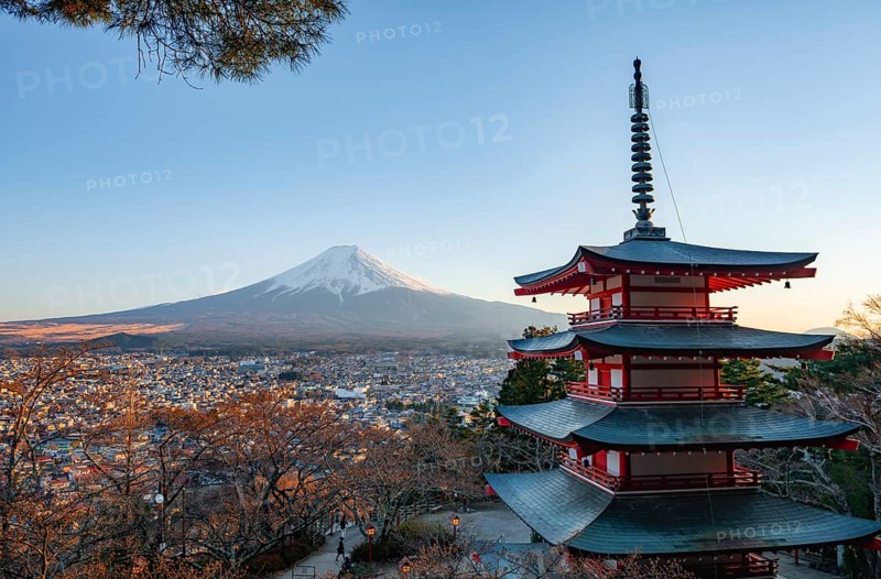 Five-story pagoda of a Shinto Shrine, Chureito Pagoda, with views of Fujiyoshida City and Mount Fuji volcano at sunset, Arakura Fuji Sengen Shrine, Arakurayama Sengen Park, Yamanashi Prefecture, Japan