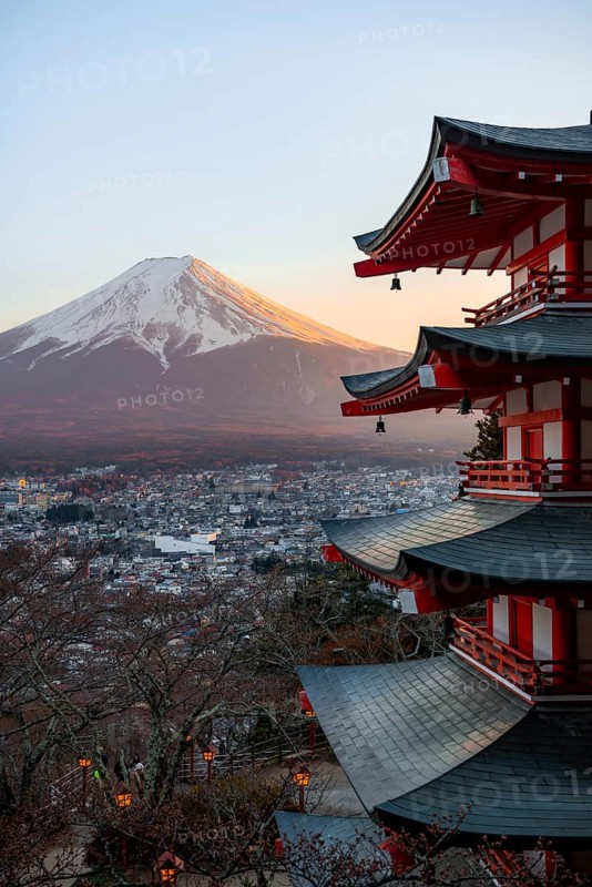 Five-story pagoda of a Shinto Shrine, Chureito Pagoda, with views of Fujiyoshida City and Mount Fuji volcano at sunset, Arakura Fuji Sengen Shrine, Arakurayama Sengen Park, Yamanashi Prefecture, Japan