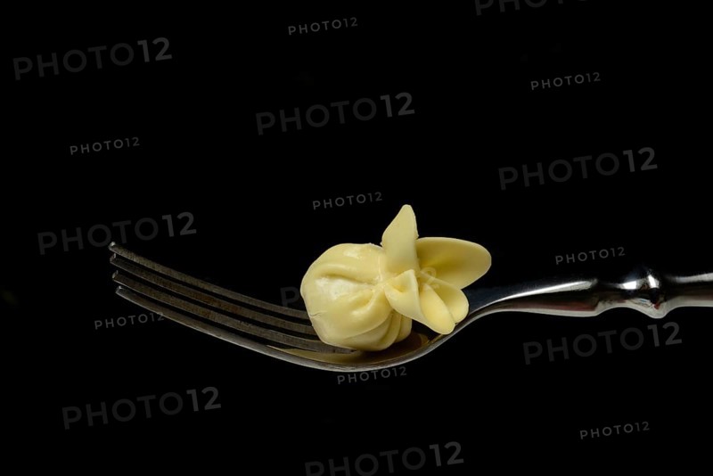 Saccottini, type of Italian pasta on fork, pasta from Italy