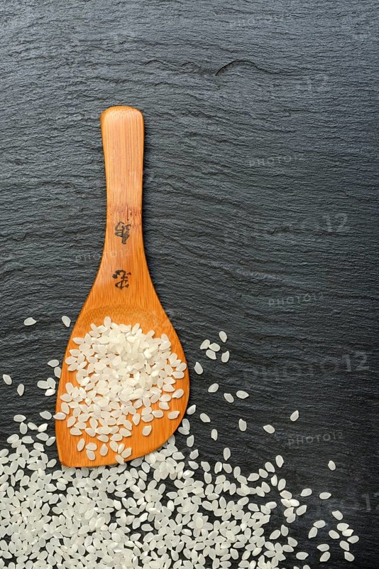 Rice grains with cooking spoon, rice