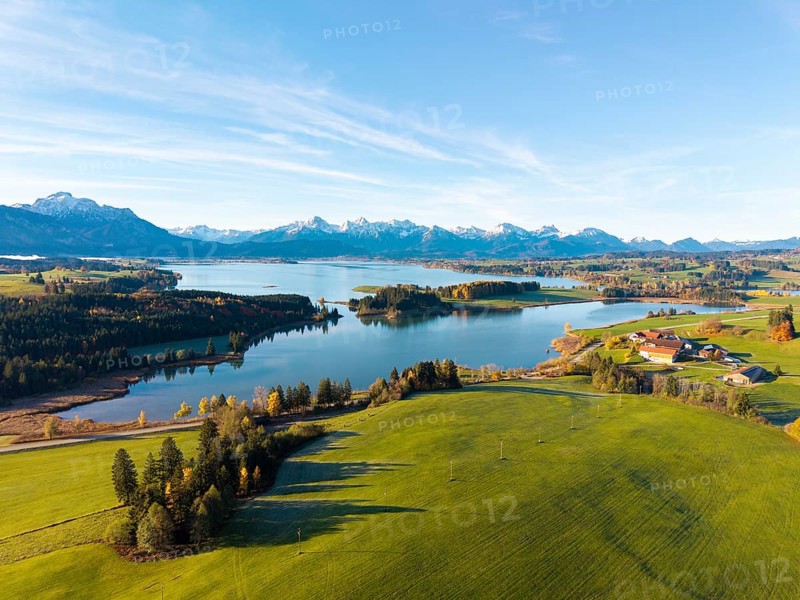Extensive landscape with a central lake and mountains in the background, Illasbergsee, Forggensee, near Roßhaupten, Ostallgäu, Allgäu, Swabia, Bavaria, Germany