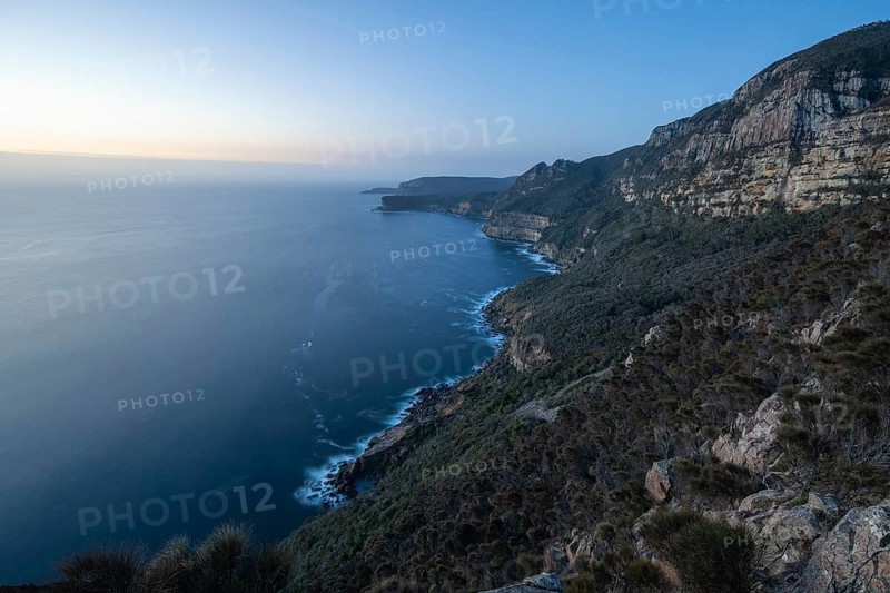 Shipstern Bluff viewpoint. Blue hour with long exposure showing sunset over the cliffs of Cape Raoul, Tasman Peninsula, Tasmania, Australia