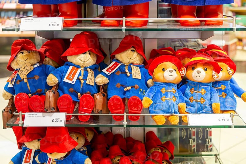 Paddington Bear toys on display, shopping area in departures lounge area, Terminal 5, London Heathrow airport, London, England, UK