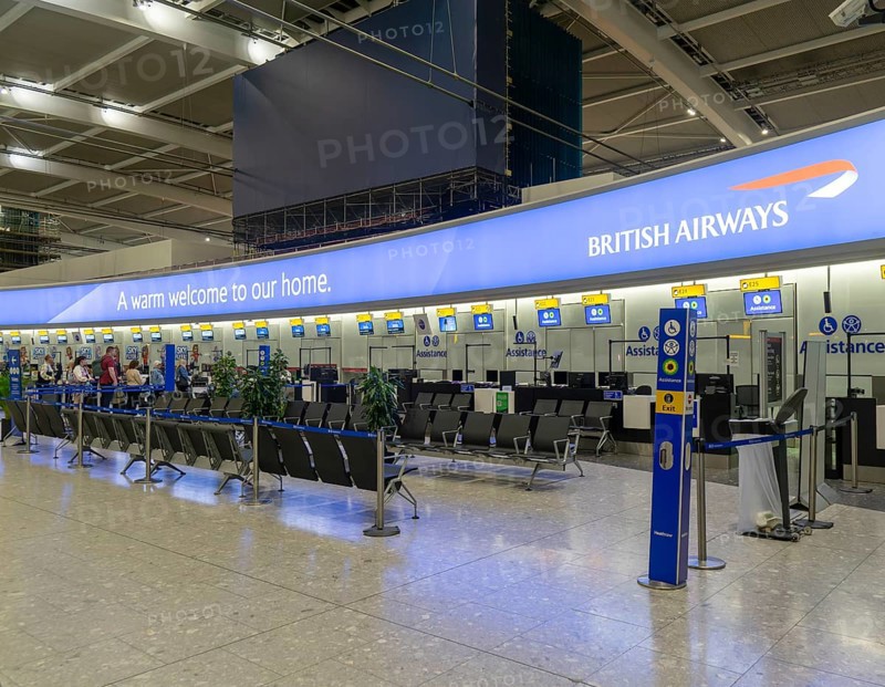 British Airways check in bag drop area, Terminal 5 London Heathrow airport, London, England, UK