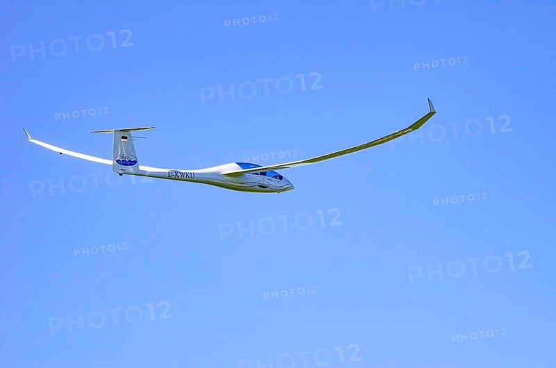 A Schempp-Hirth Arcus E motor glider, registration D-KWKU, during a screening as part of an air show at the Fliegerbergfest of the Rossfeld Luftsportverein in Metzingen-Glems, Baden-Württemberg, Germany, for editorial use only