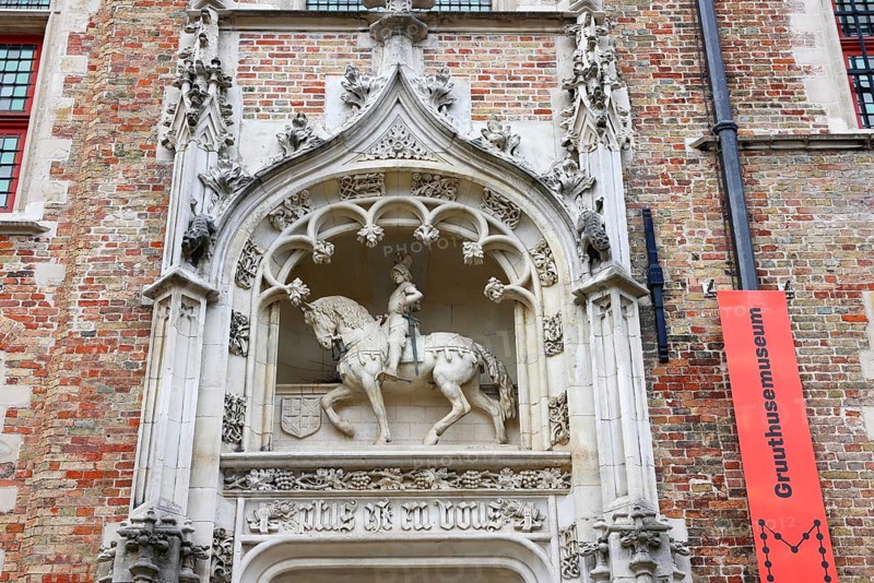 Gruuthusemuseum with equestrian statue of Lodewijk van Gruuthuse above the entrance portal in the historic old town of Bruges, UNESCO World Heritage Site, Flanders, Belgium
