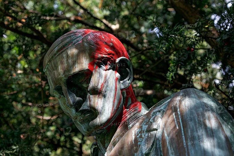 Colonial War Memorial, head sprayed with red paint, in commemoration of the Herero and Nama genocide in German Southwest Africa, Düsseldorf, North Rhine-Westphalia, Germany