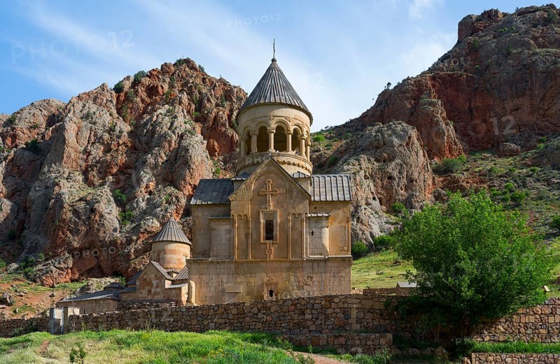 Church with dome in picturesque mountain scenery, surrounded by rocks, Noravank monastery, Surb Astvatsatsin mausoleum church and Surb Karapet baptism church, Noravank, Vayots Dzor province, Wajoz Dzor, Armenia, Caucasus