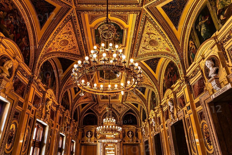 Sumptuous room and chandelier in the Vienna State Opera, Vienna, Austria