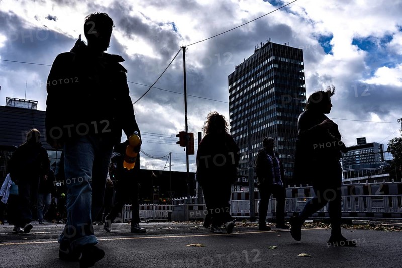 Passers-by in downtown Essen at the main train station, North Rhine-Westphalia, Germany