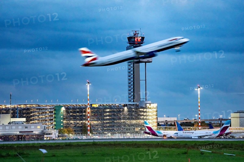 Airplane taking off from Düsseldorf Airport, Air Traffic Control Tower, North Rhine-Westphalia, Germany