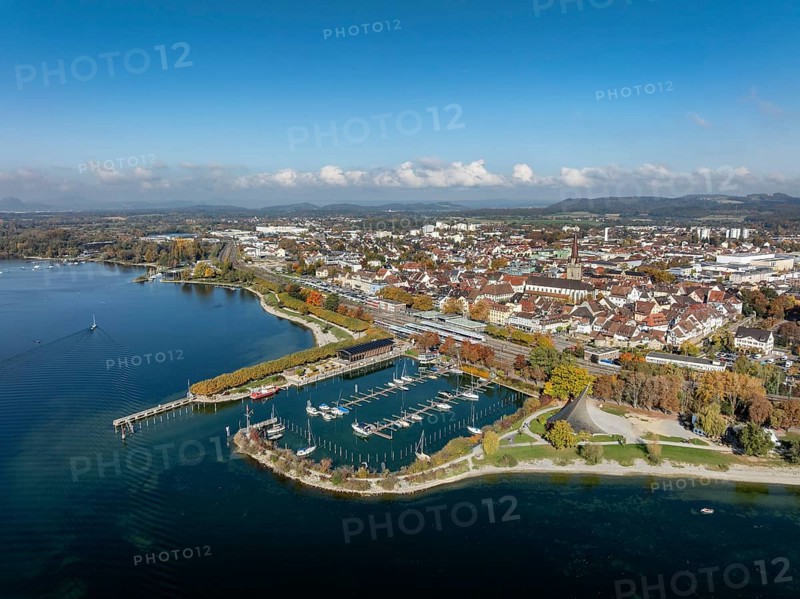 Aerial view of the town of Radolfzell on Lake Constance with the Wäschbruckhafen, harbour pier and concert sail, on the horizon the Hegauberge, district of Konstanz, Baden-Württemberg, Germany